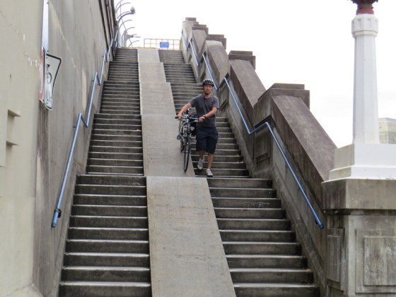 There is a cycle track over the bridge - here a cyclist is coming down from the bridge