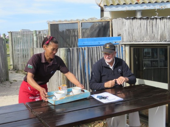 Our lovely waitress serving our coffees